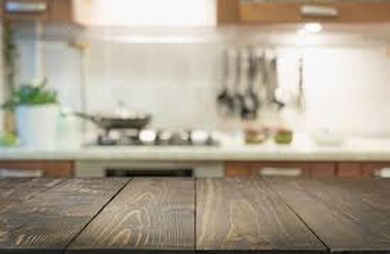 blurred-abstract-background-modern-kitchen-with-tabletop-and-space-for-display-your-products_91908-1263
